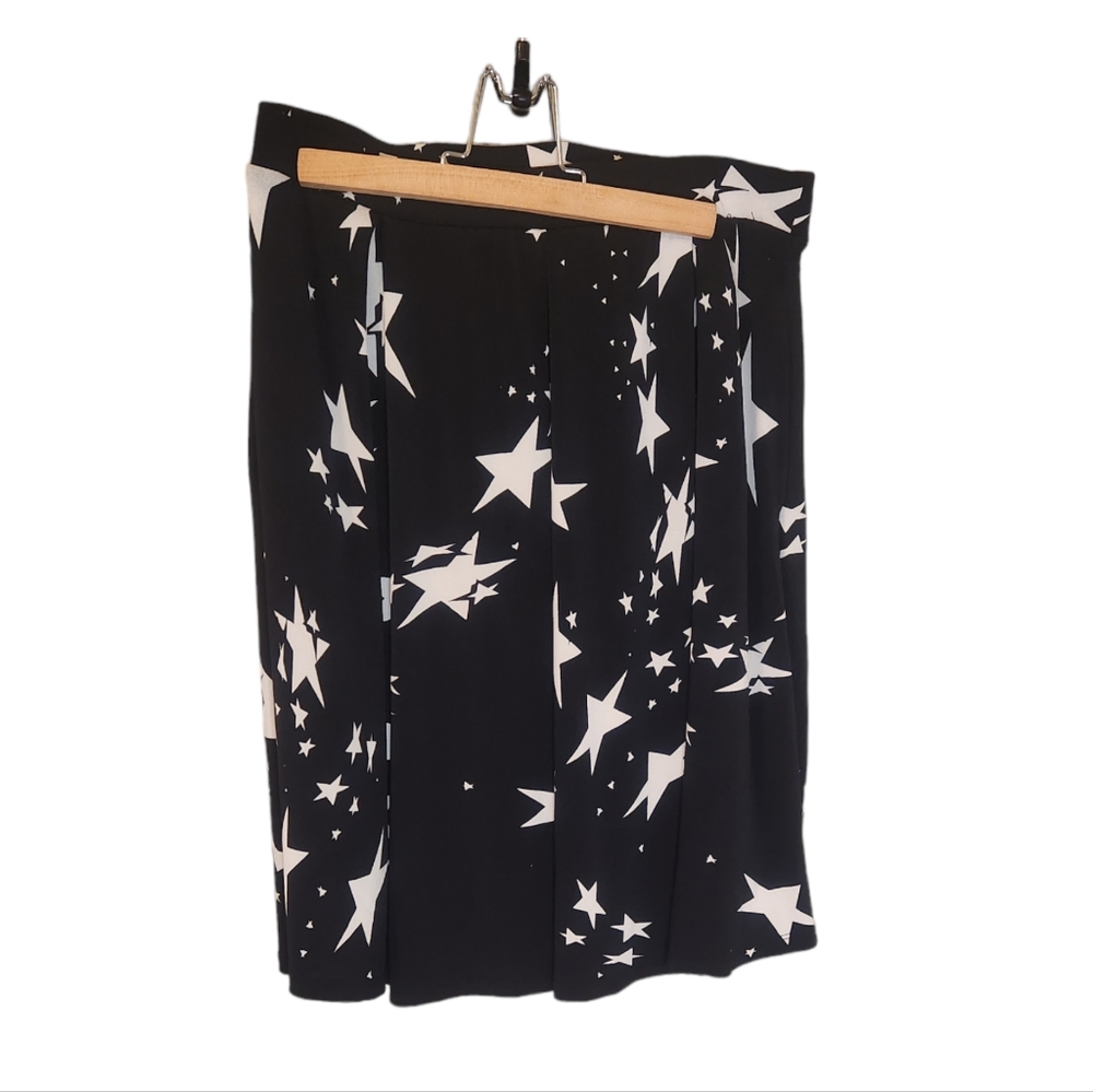 LulaRoe black and white skirt filled with stars. Size small but can fit …